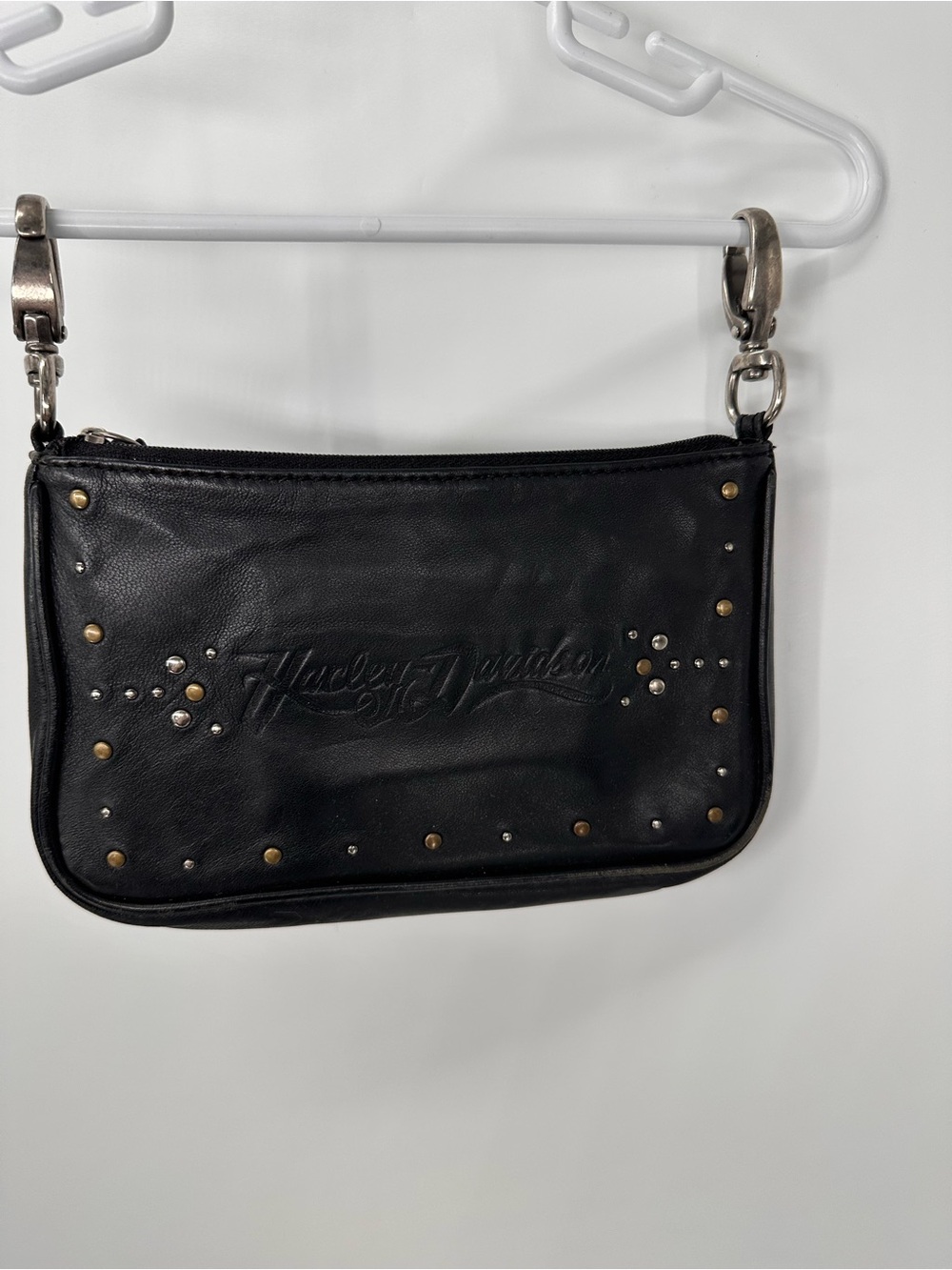 Harley-Davidson Black Lambskin Belt Bag with an embossed logo and stud detail.